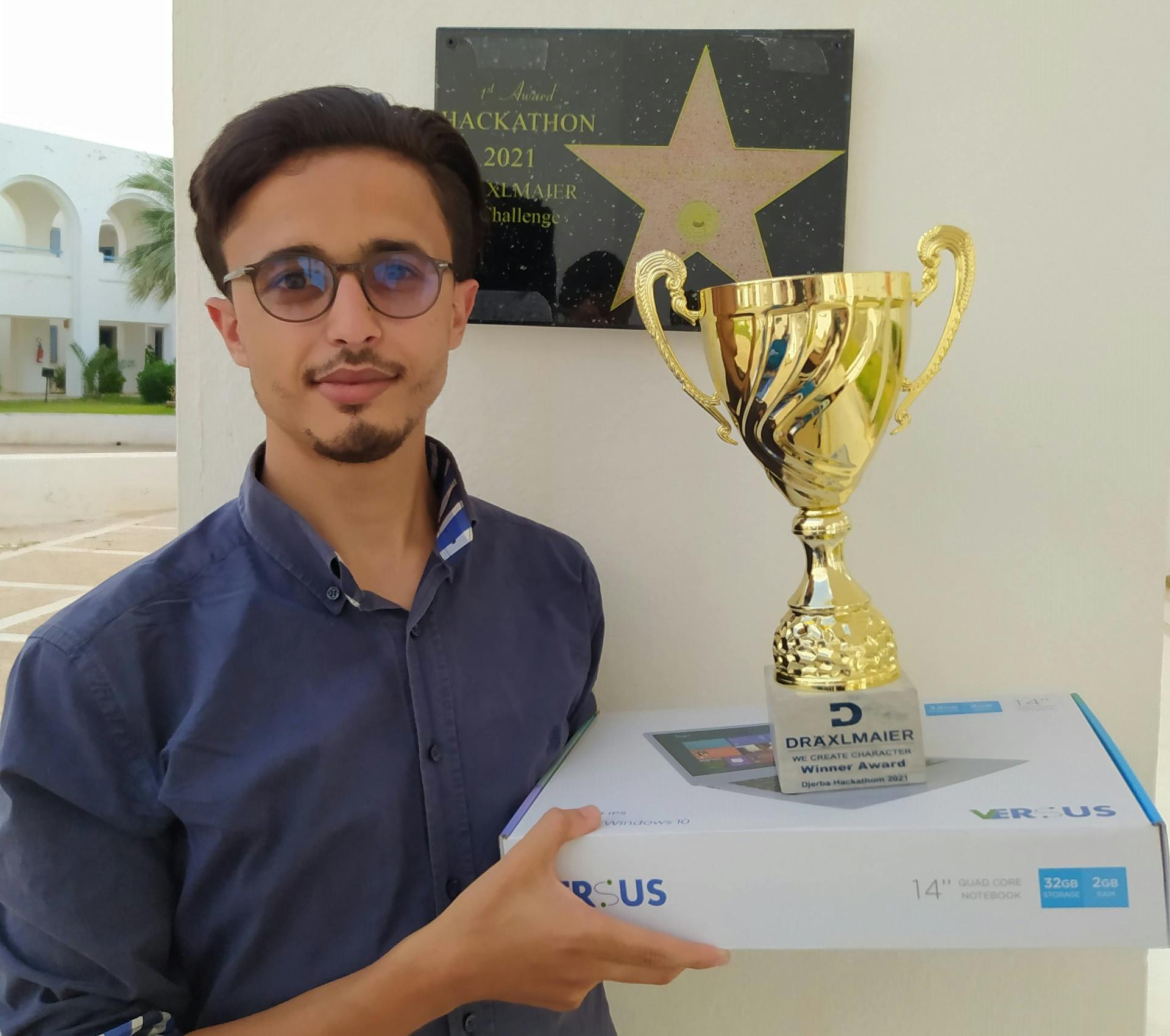 Malek khannoussi get rewards for winning a hackathon between universities in tunisia